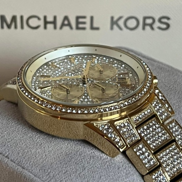 Michael Kors Women’s Ritz Pave Gold-Tone Watch
Case Size: 37mm
MSRP: $725 - Picture 5 of 11